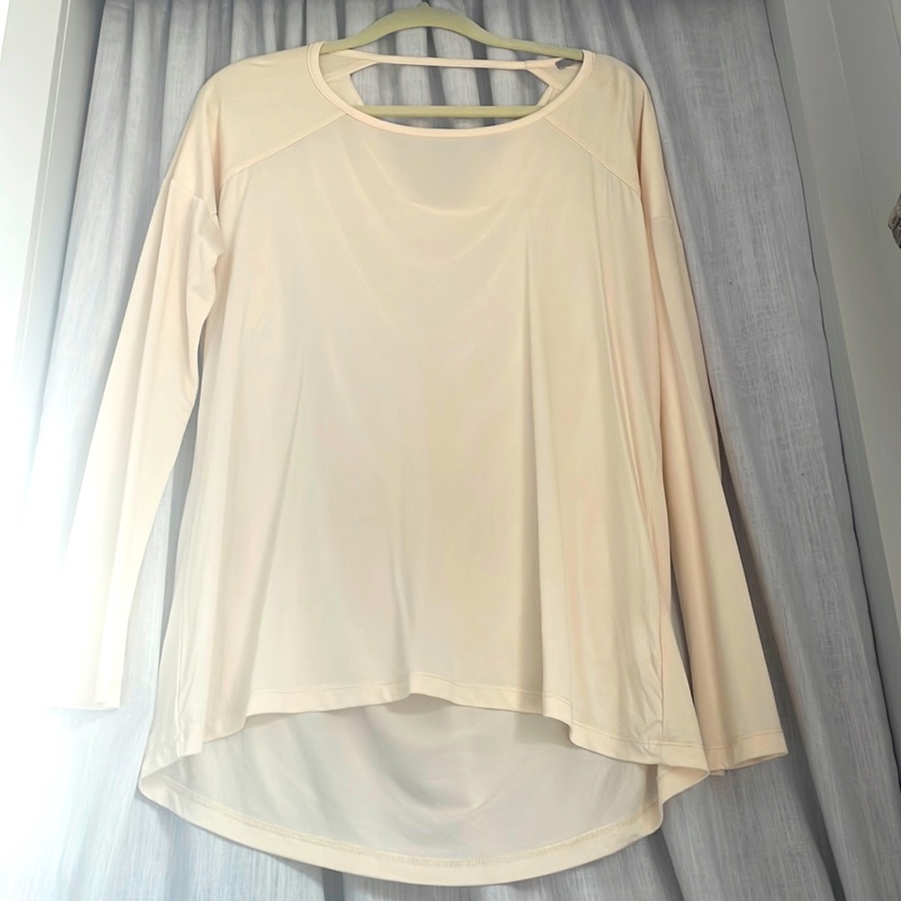 Blush color top.  With sexy cut out in back
